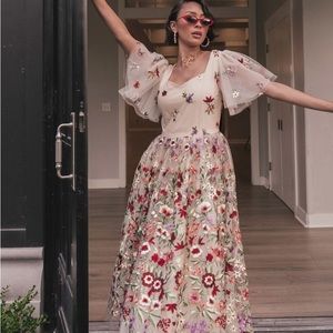 New JessiKae Florence dress with embroidered floral on cream.